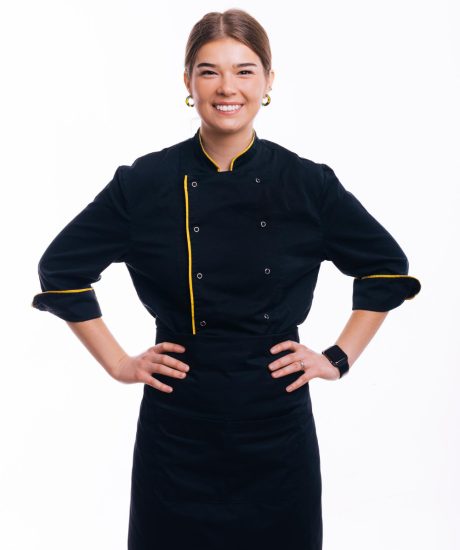 portrait-beautiful-woman-chef-posing-with-hands-waist-white-background